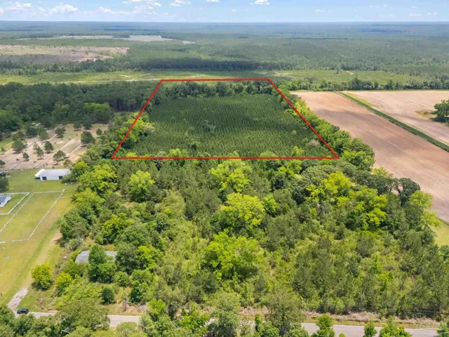 a view of a lake with a big yard