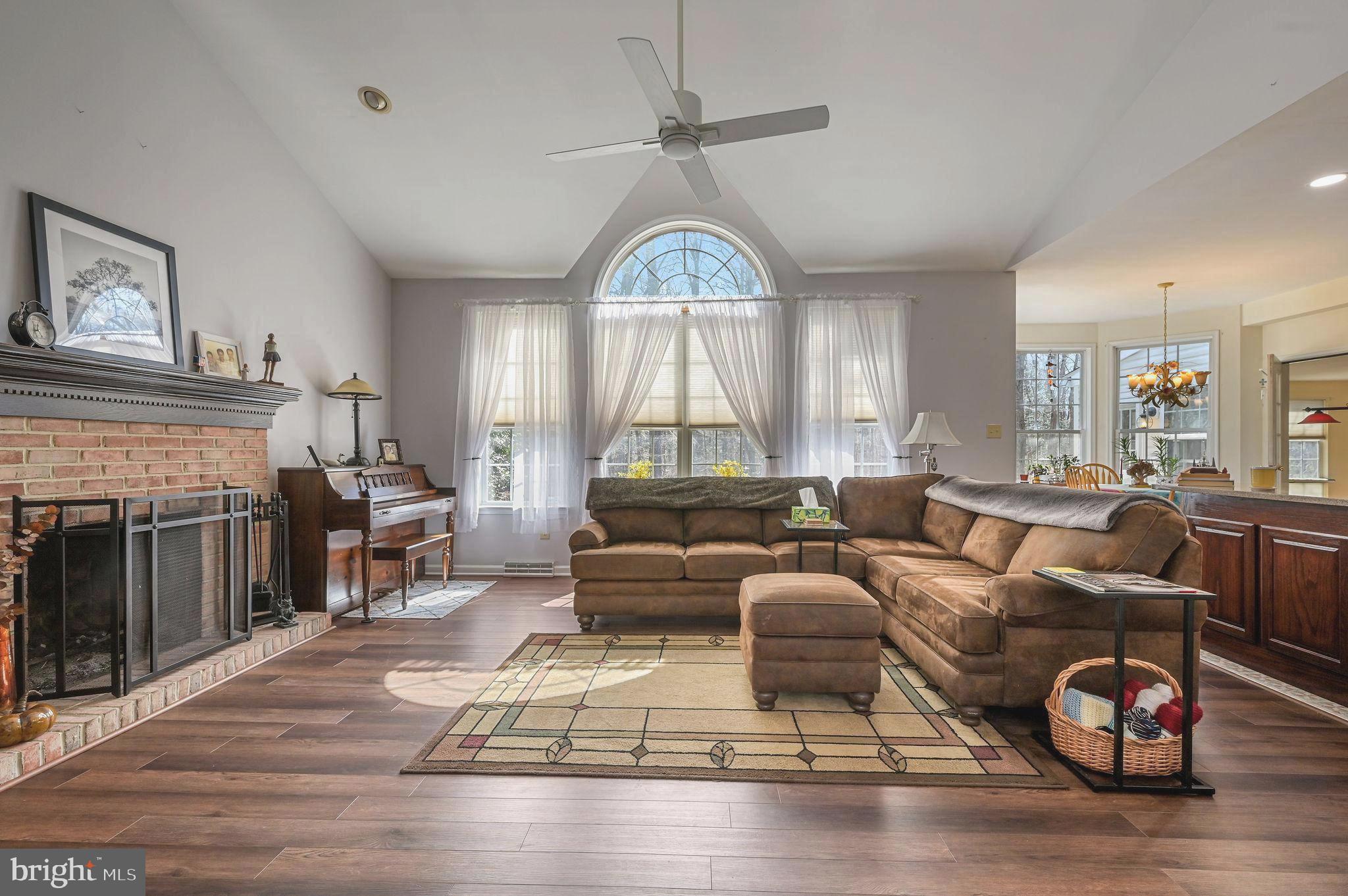 7 Shinnecock Road Dover, DE 19904 - Photo 11 of 33 Spacious living room with a wood burning fireplace