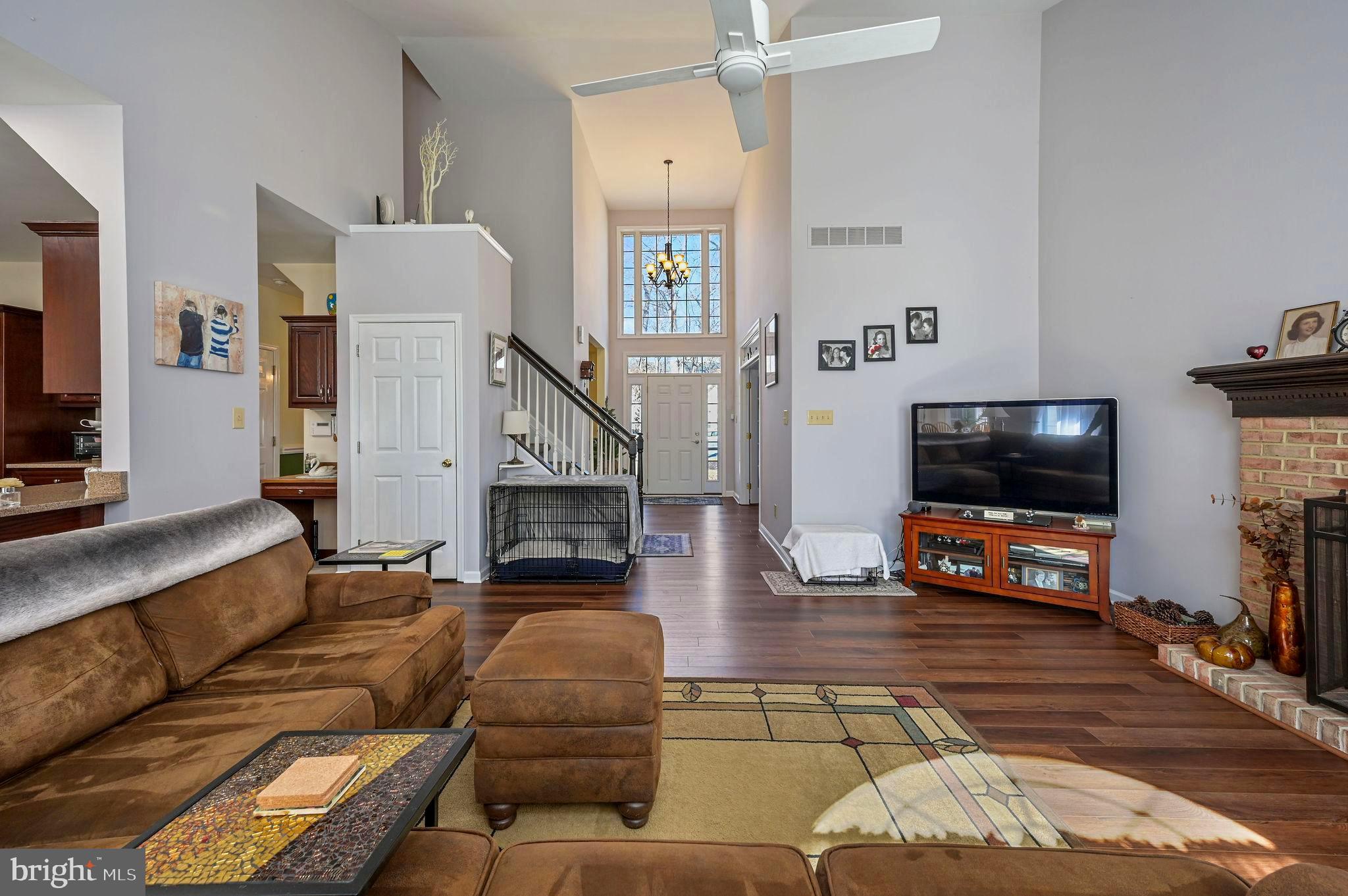 7 Shinnecock Road Dover, DE 19904 - Photo 13 of 33 Spacious living room with a wood burning fireplace