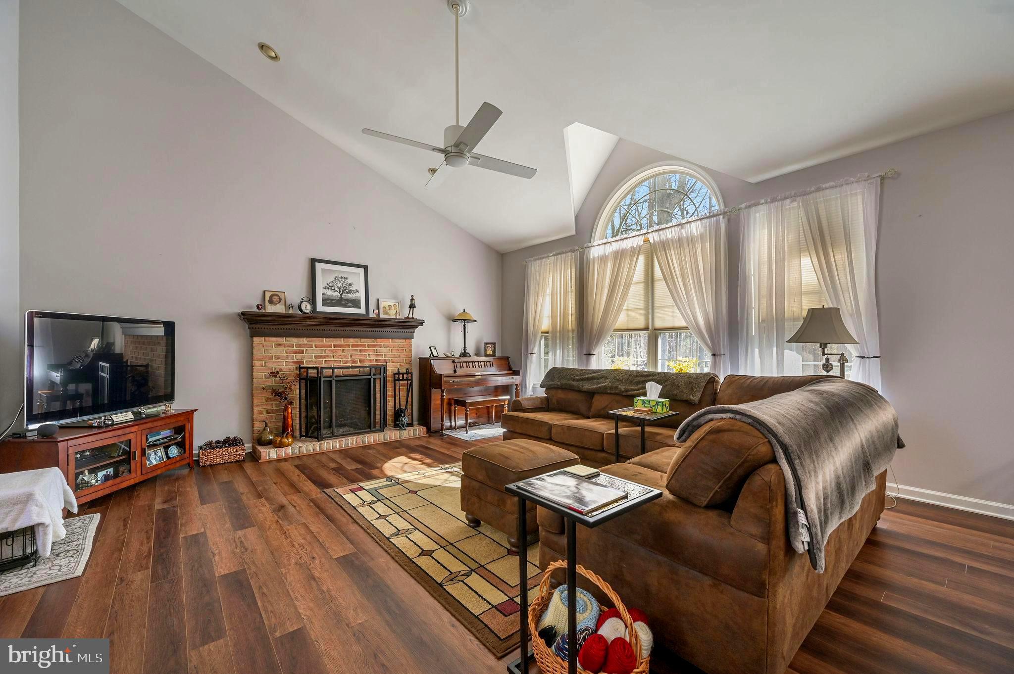 7 Shinnecock Road Dover, DE 19904 - Photo 15 of 33 Spacious living room with a wood burning fireplace
