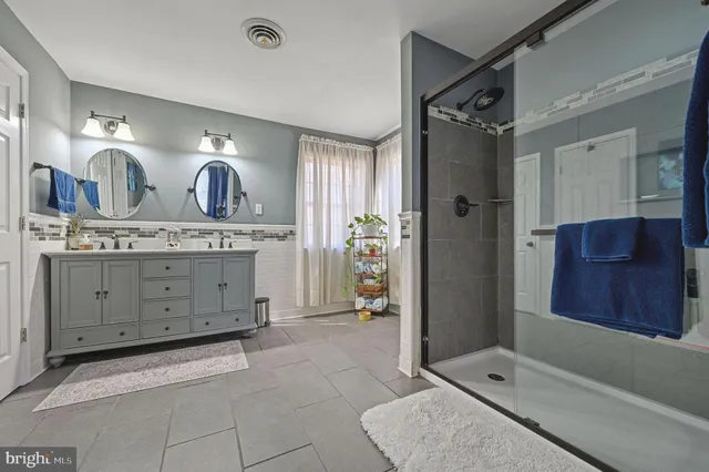 a view of cabinets a sink and a window