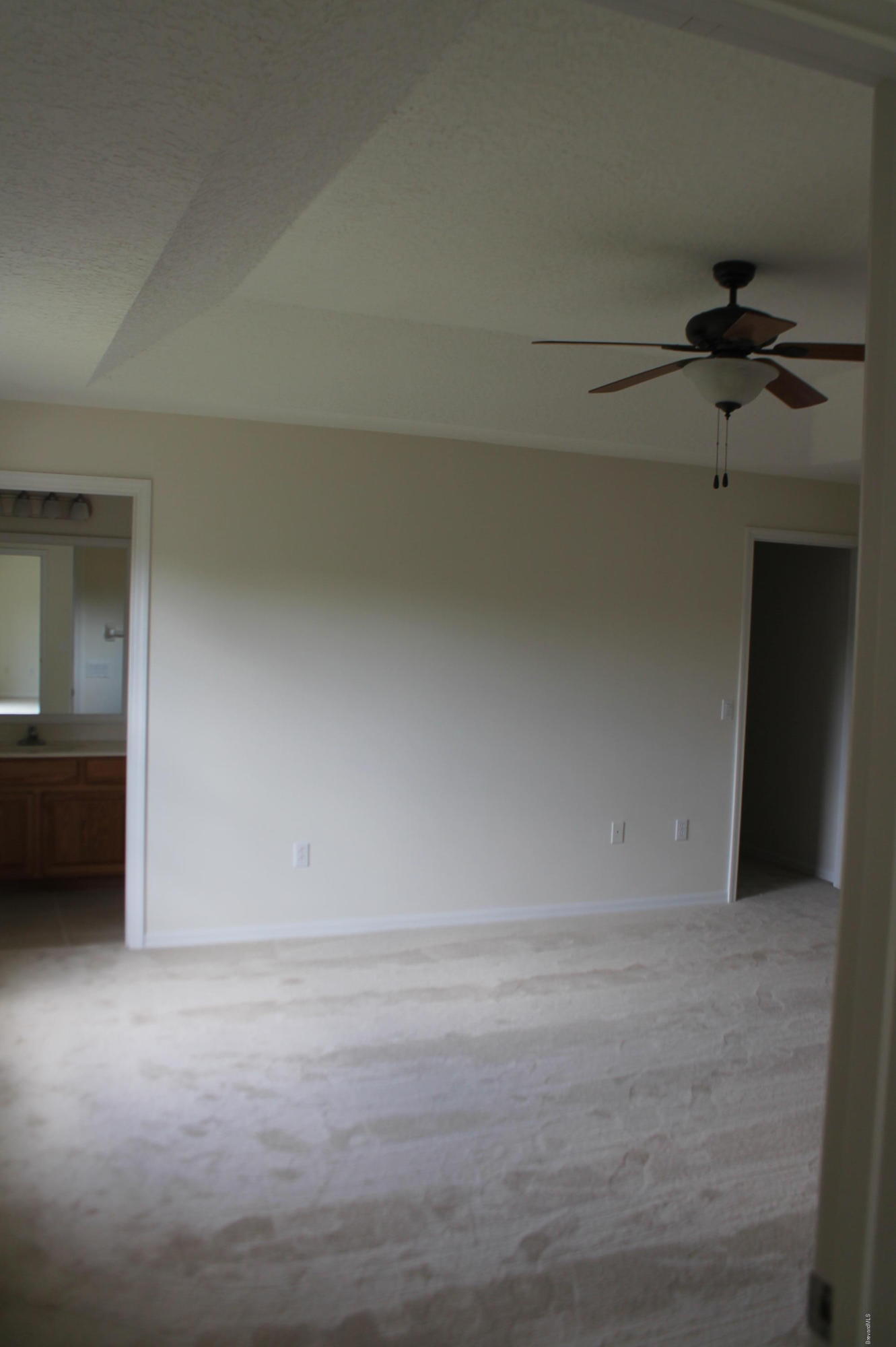 575 Amber Lane Cocoa, FL 32926 - Photo 9 of 16 a view of an empty room and a window