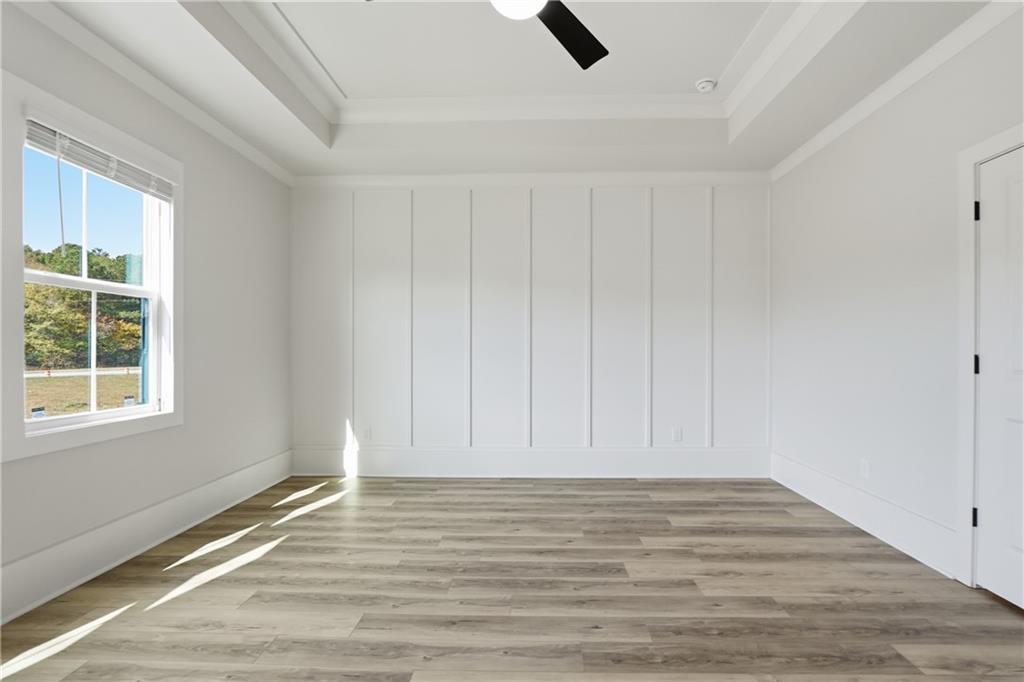 331 Orchid Street Braselton, GA 30517 - Photo 35 of 57 wooden floor in an empty room