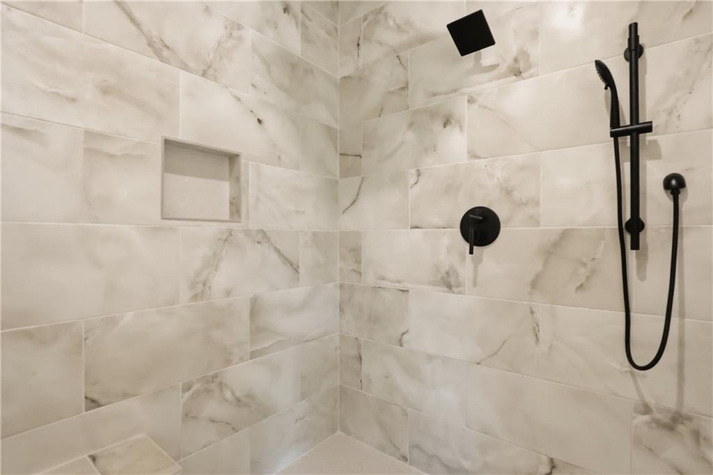 331 Orchid Street Braselton, GA 30517 - Photo 41 of 57 a bathroom with a shower