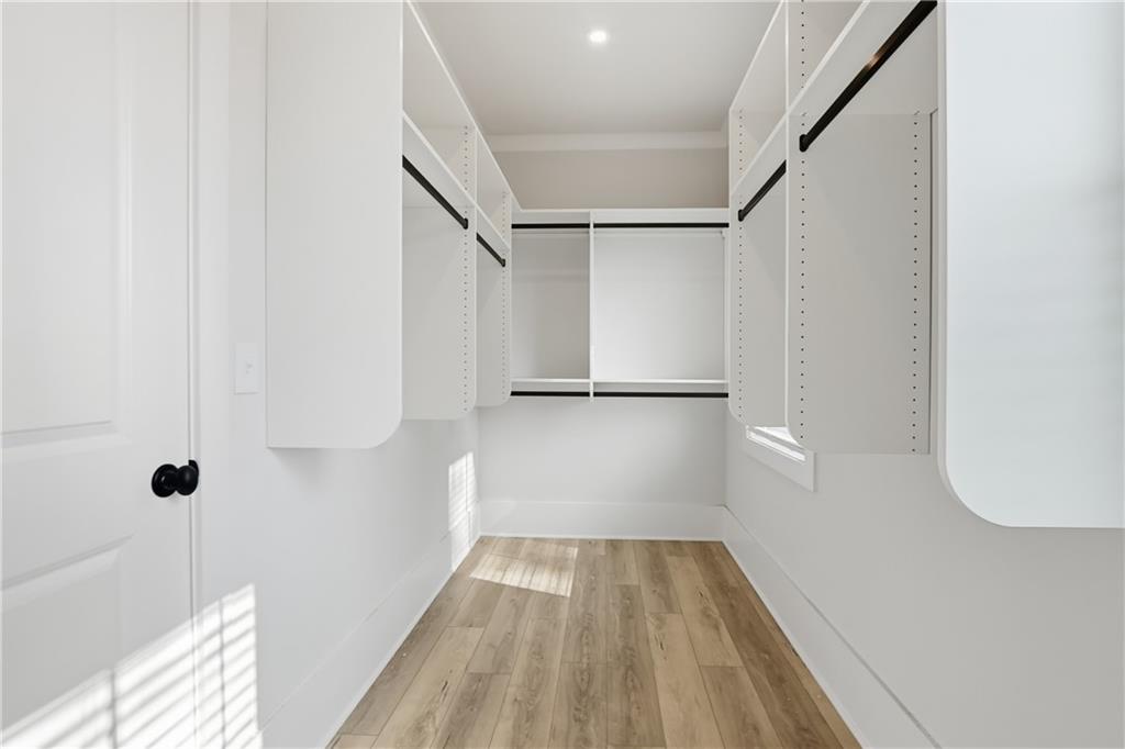 331 Orchid Street Braselton, GA 30517 - Photo 44 of 57 a view of a room with wooden floor and staircase