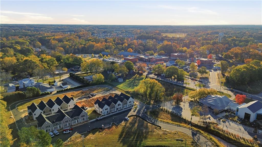 331 Orchid Street Braselton, GA 30517 - Photo 52 of 57 an aerial view of residential houses with outdoor space