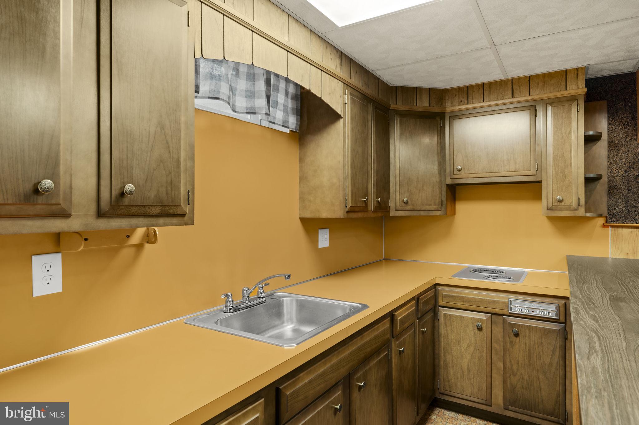 218 Lauschtown Road Denver, PA 17517 - Photo 53 of 78 a kitchen with a sink and cabinets