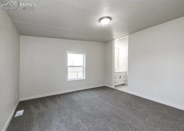 a view of a livingroom and a window