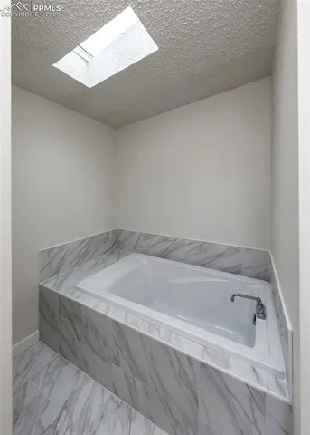 a dining room with furniture window and wooden floor