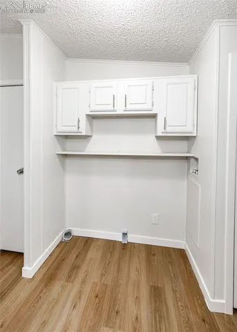 a view of an empty walk in closet