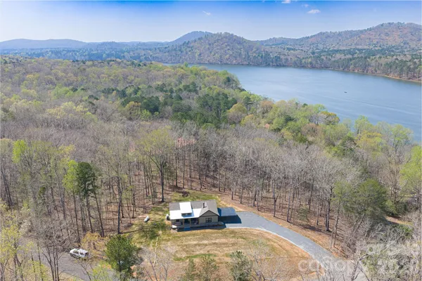 a view of a town with mountains in the background