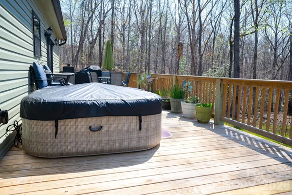 a view of a house with backyard and porch