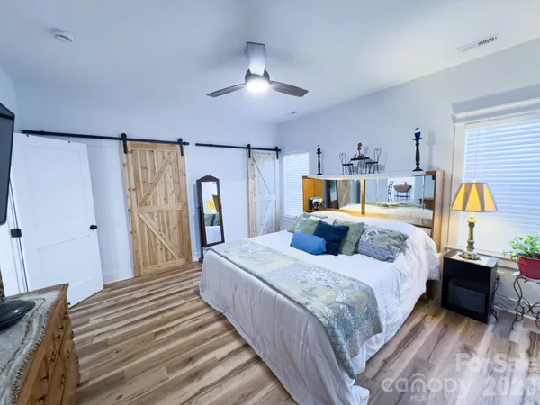 a bath room with a sink and a mirror