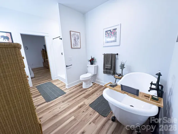 a white bath tub sitting in a bathroom