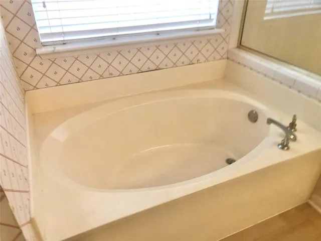 a bathroom with a bathtub