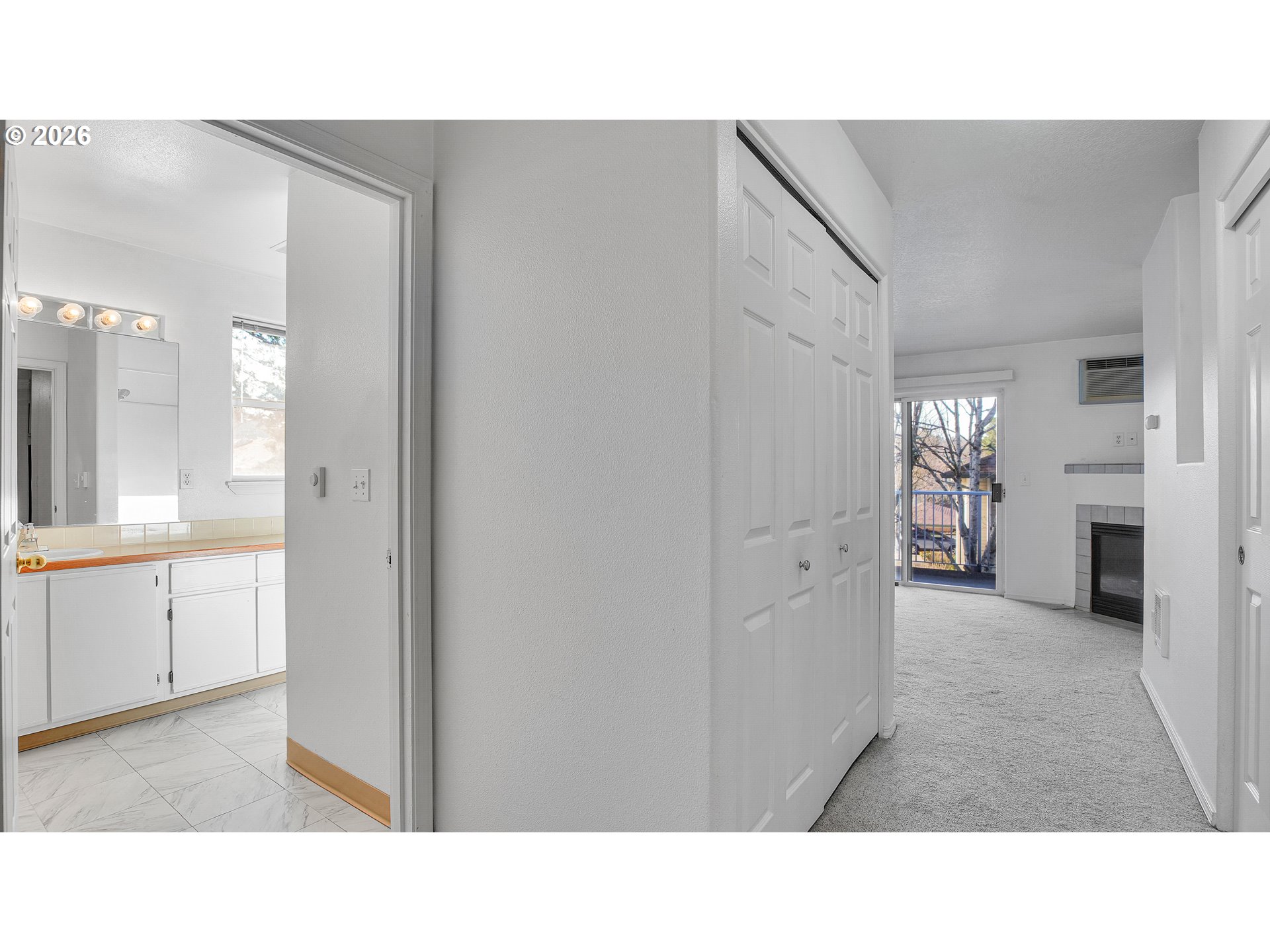 4614 West Powell Boulevard, Unit 258 Gresham, OR 97030 - Photo 23 of 43 a open living room with white cabinets and sink