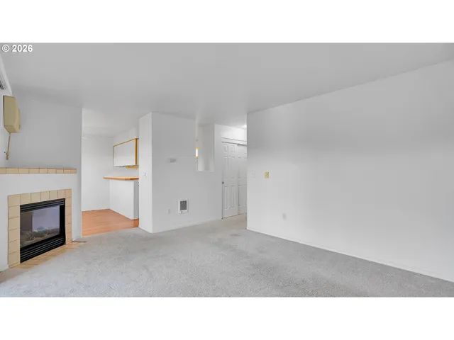 a open hall with a fireplace