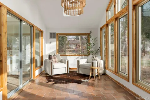 a bed room with a bed and a fireplace