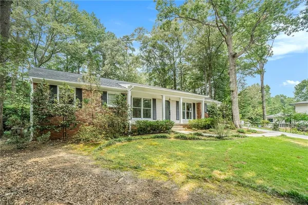 front view of a house with a yard
