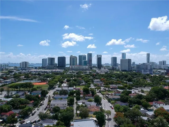 a view of a city with tall buildings