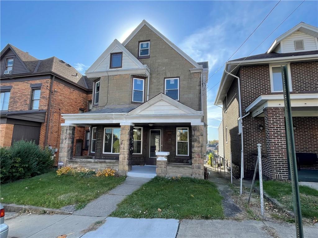 11 Frazier Avenue McKees Rocks, PA 15136 - Photo 1 of 22 a view of a yard in front of house