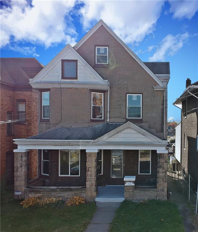 11 Frazier Avenue McKees Rocks, PA 15136 - Photo 22 of 22 a front view of a house with a yard