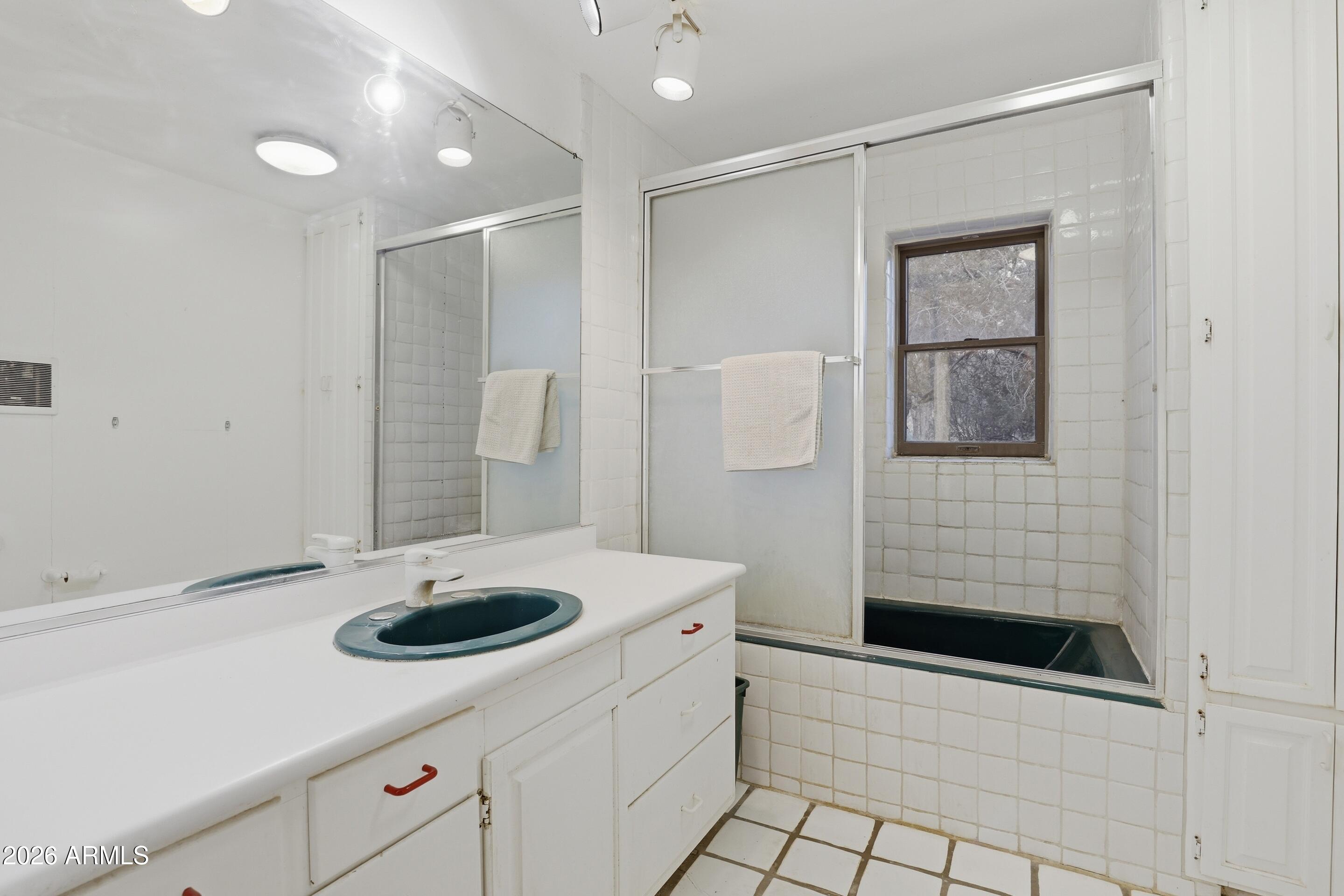 8135 West Gibson Ranch Road Payson, AZ 85541 - Photo 17 of 43 a bathroom with a sink a toilet and shower