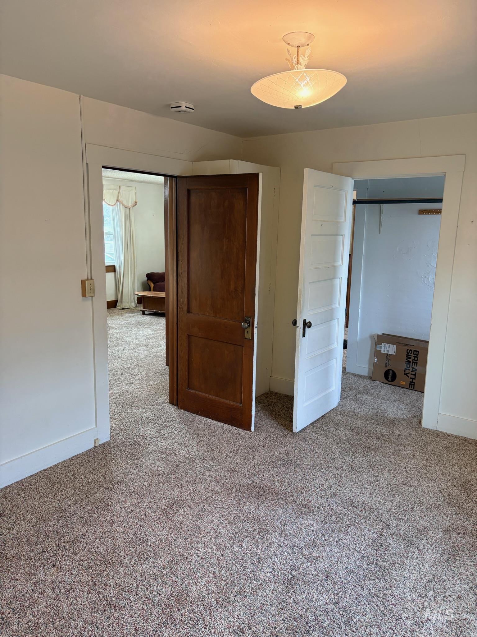 627 Southwest 3rd Street Fruitland, ID 83619 - Photo 17 of 35 Unfurnished bedroom with light colored carpet