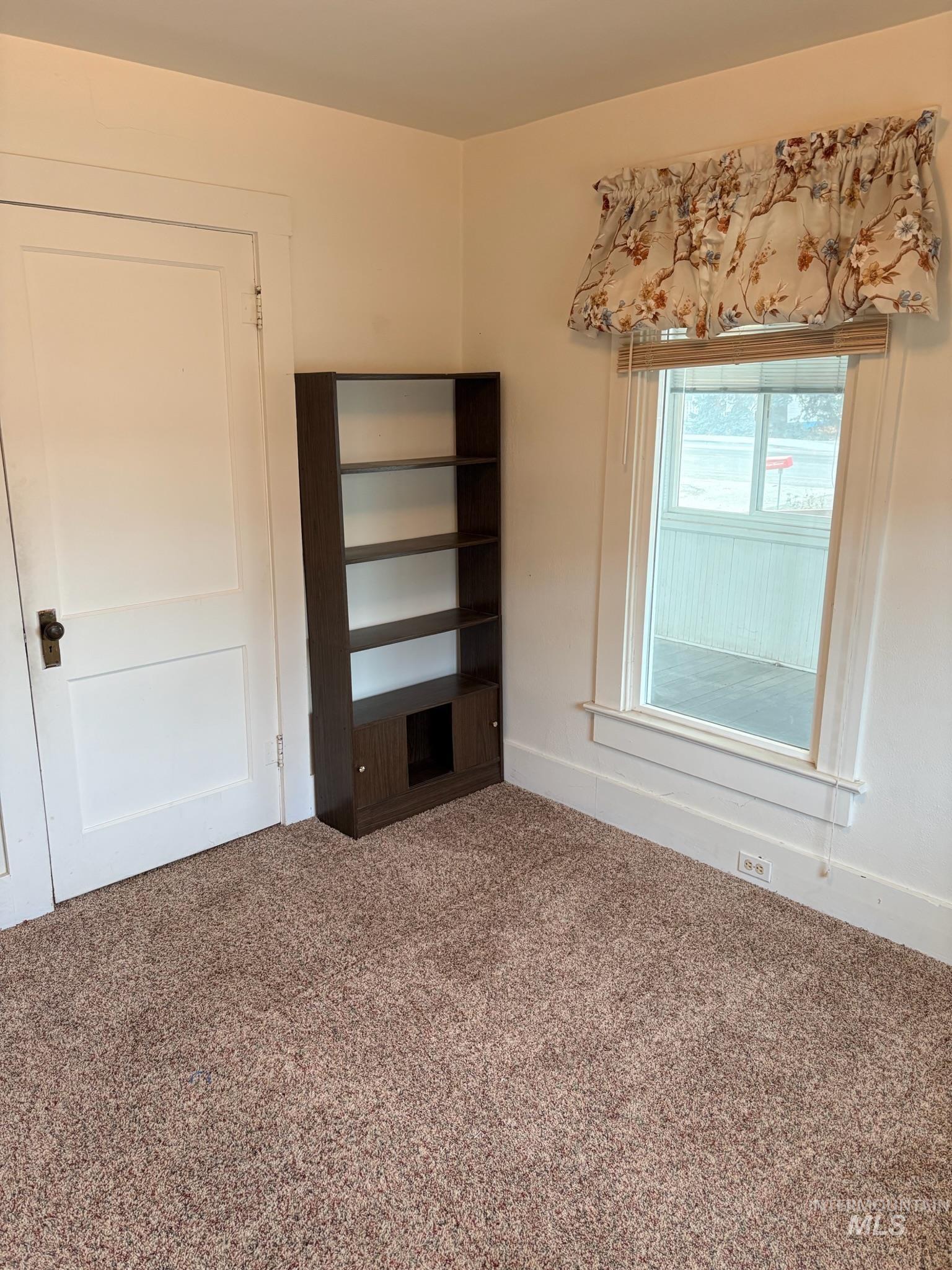 627 Southwest 3rd Street Fruitland, ID 83619 - Photo 22 of 35 Carpeted empty room with baseboards