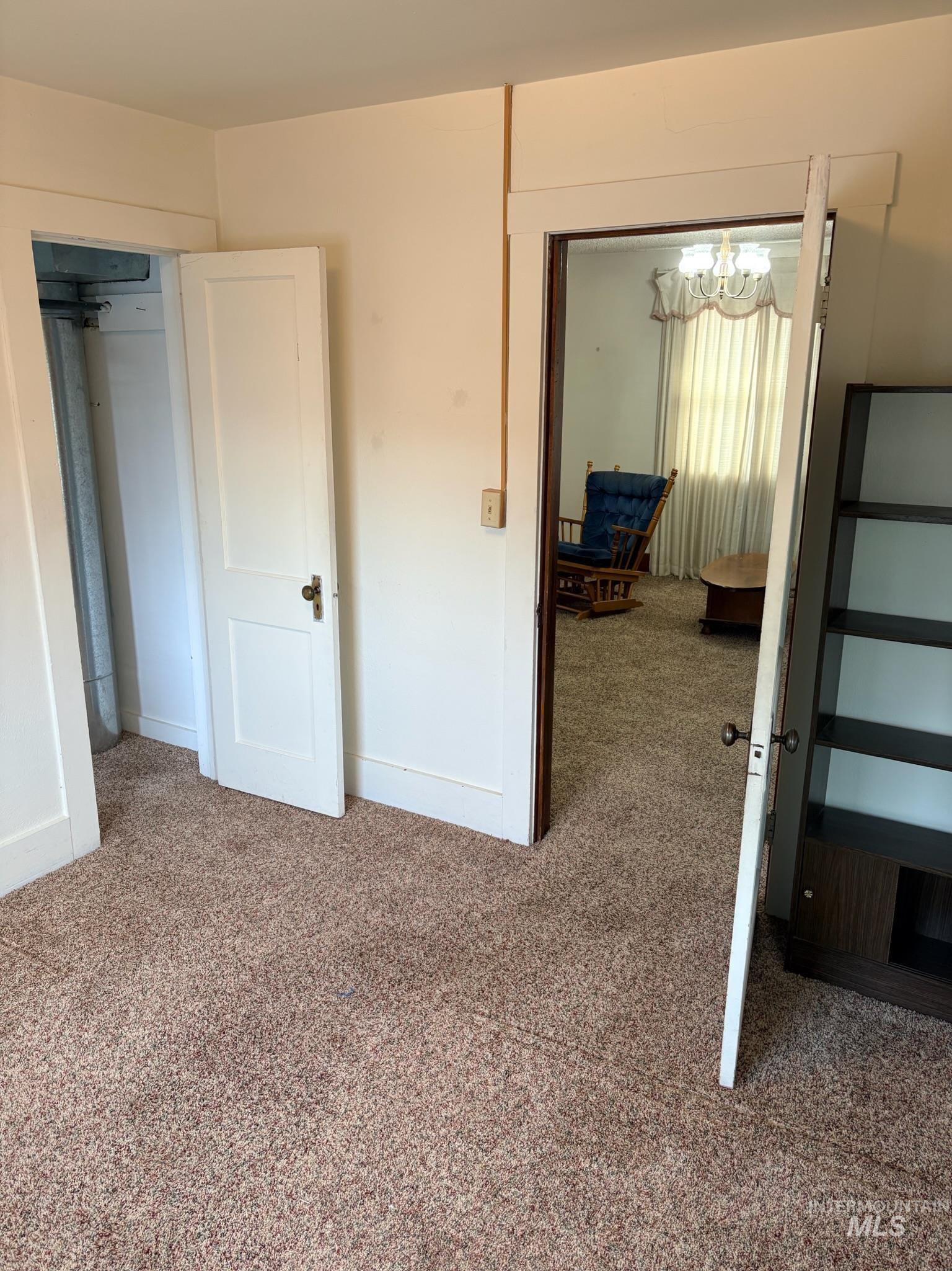 627 Southwest 3rd Street Fruitland, ID 83619 - Photo 23 of 35 Carpeted bedroom featuring baseboards