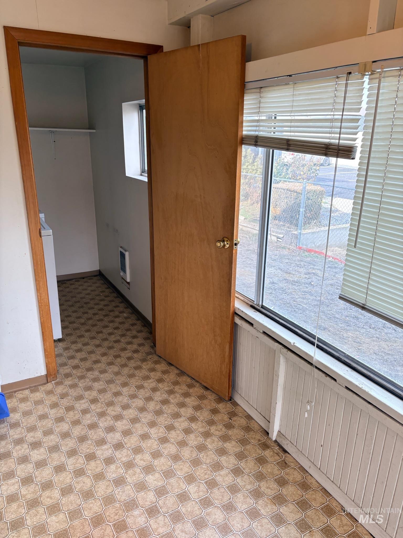 627 Southwest 3rd Street Fruitland, ID 83619 - Photo 25 of 35 Kitchen featuring light flooring and heating unit