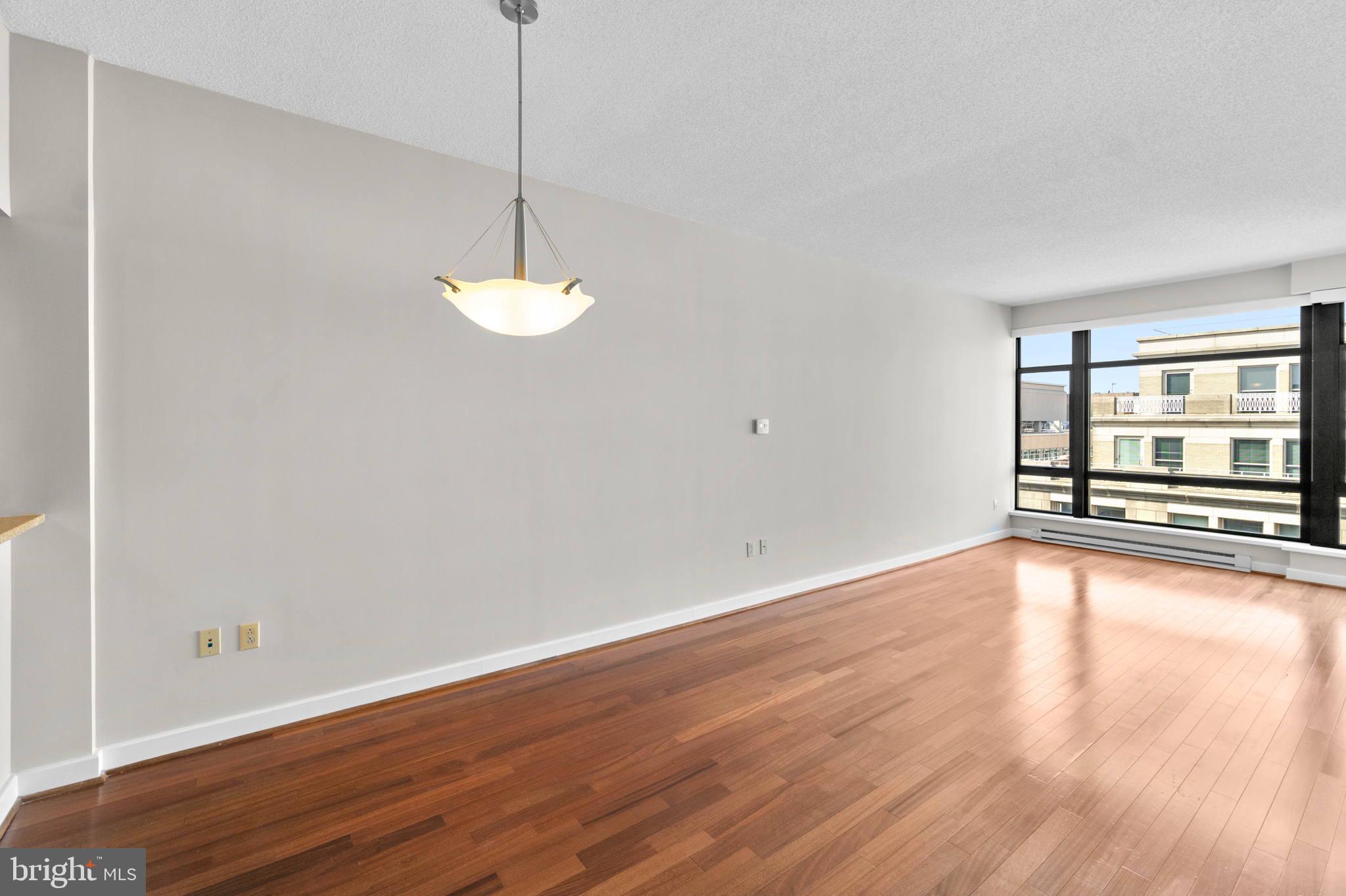 1150 K Street Northwest, Unit 1408 Washington, DC 20005 - Photo 8 of 29 Dining / Living Room
