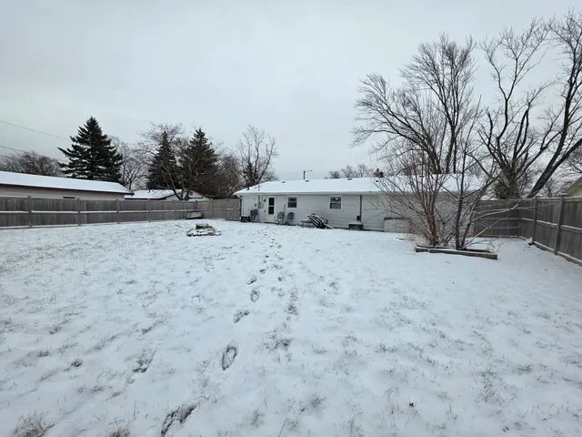 a view of a yard with a snow