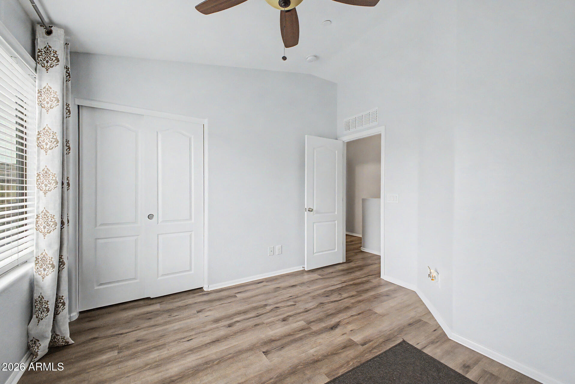 2725 East Mine Creek Road, Unit 1187 Phoenix, AZ 85024 - Photo 20 of 37 a view of an empty room