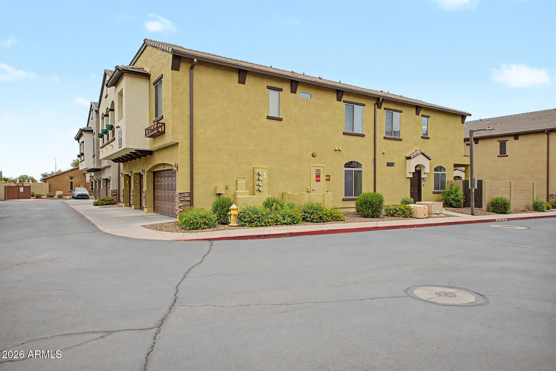 2725 East Mine Creek Road, Unit 1187 Phoenix, AZ 85024 - Photo 2 of 37 front view of a building with potted plants