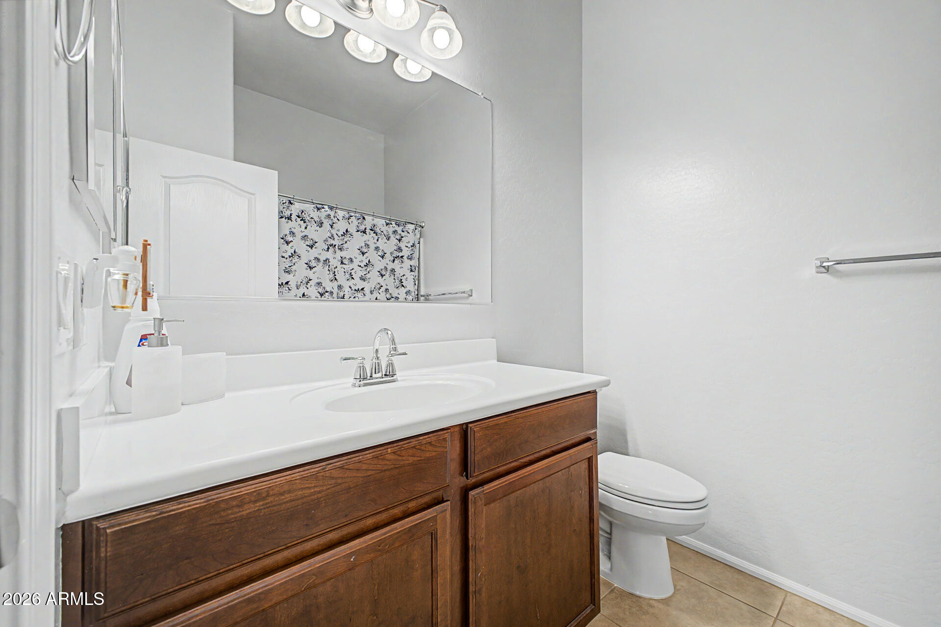 2725 East Mine Creek Road, Unit 1187 Phoenix, AZ 85024 - Photo 21 of 37 a bathroom with a sink a toilet and shower