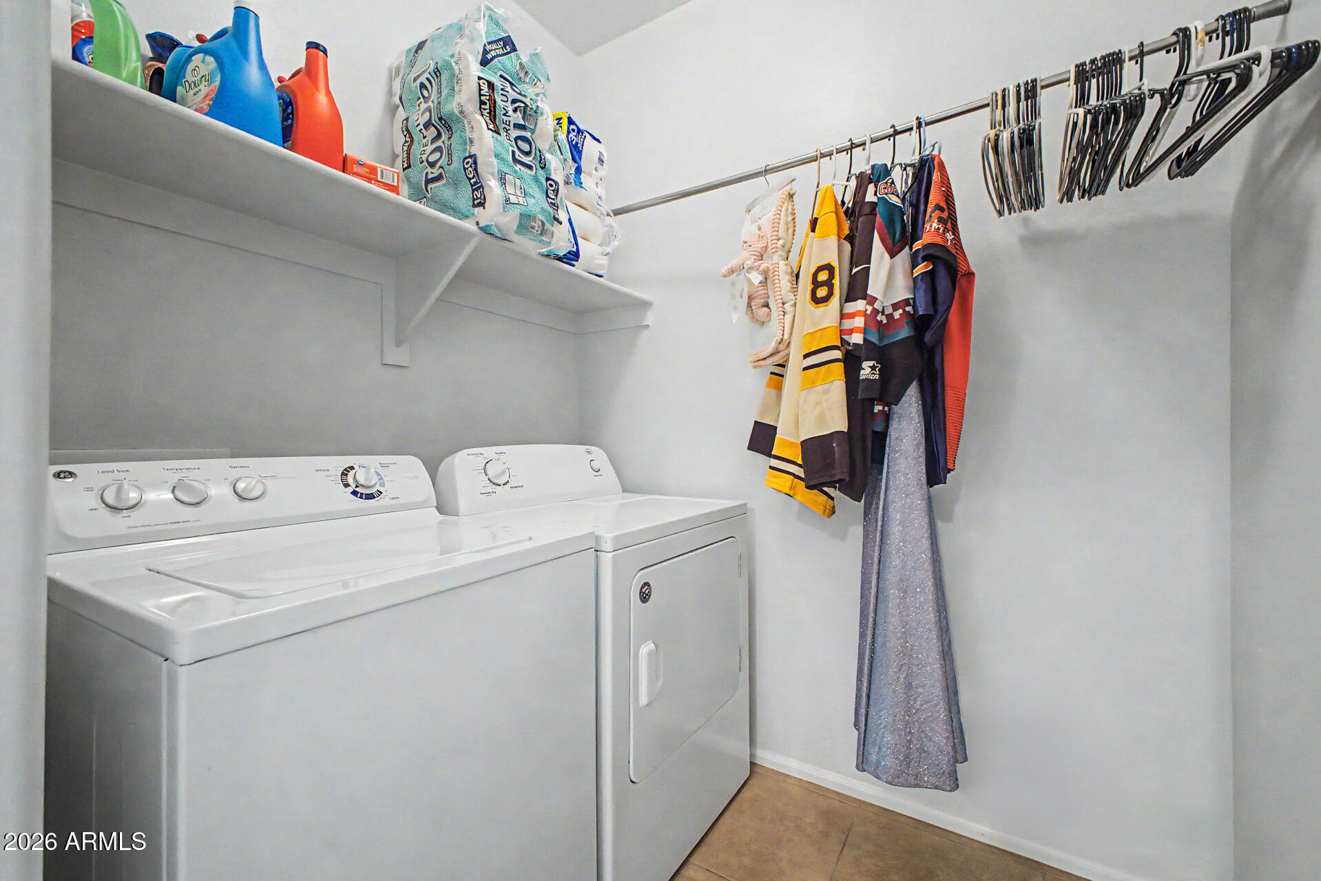 2725 East Mine Creek Road, Unit 1187 Phoenix, AZ 85024 - Photo 24 of 37 a utility room with dryer and washer