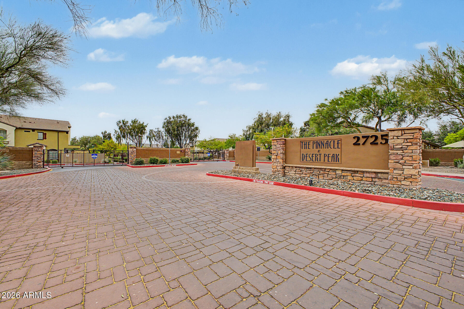 2725 East Mine Creek Road, Unit 1187 Phoenix, AZ 85024 - Photo 30 of 37 a street view with large trees