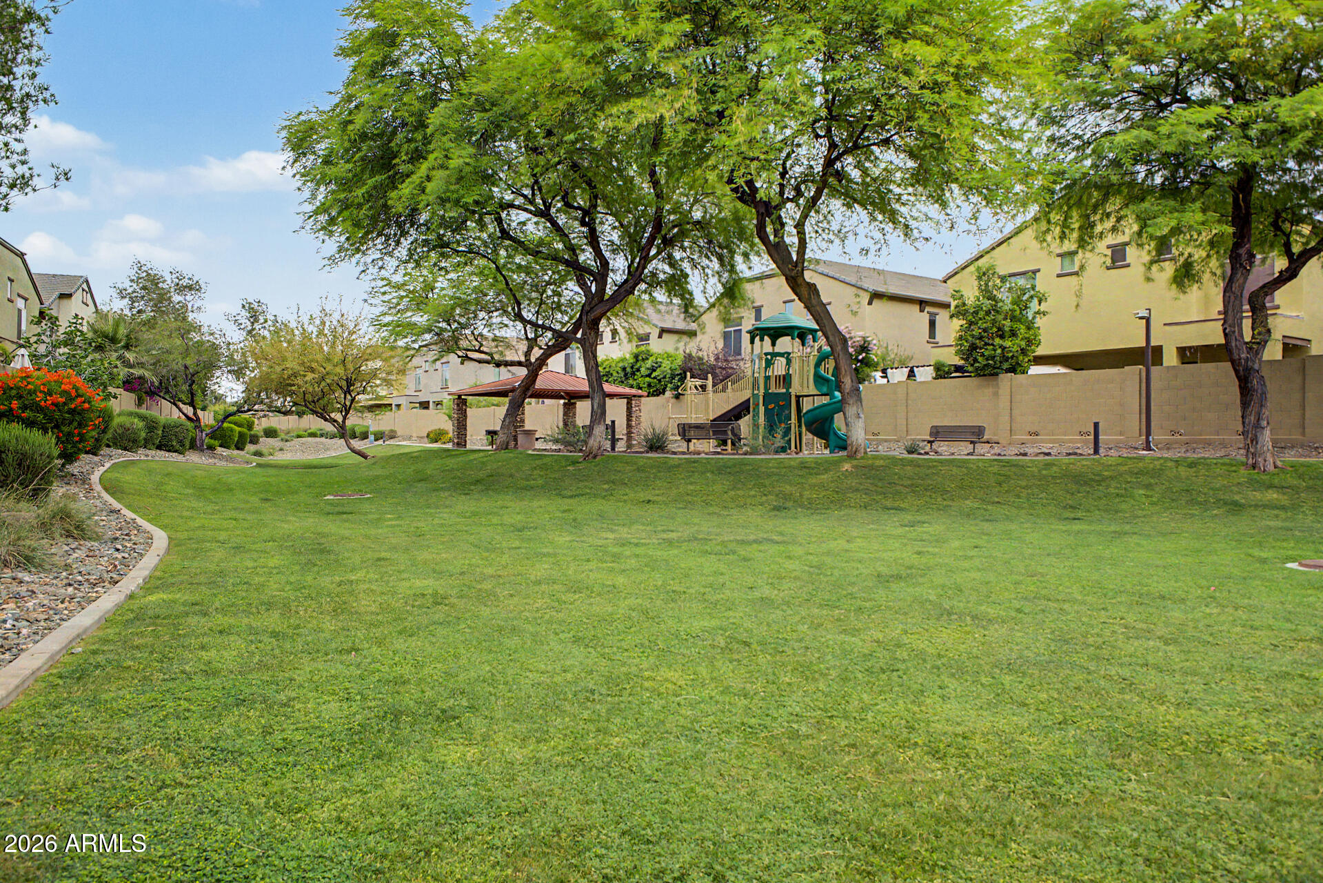2725 East Mine Creek Road, Unit 1187 Phoenix, AZ 85024 - Photo 36 of 37 a view of a house with a yard
