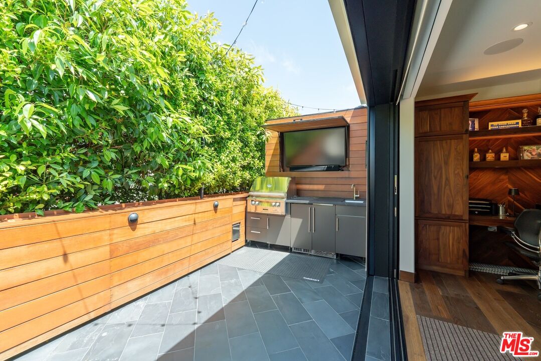 2612 Montana Avenue, Unit 1 Santa Monica, CA 90403 - Photo 23 of 27 a view of a room with a flat screen tv
