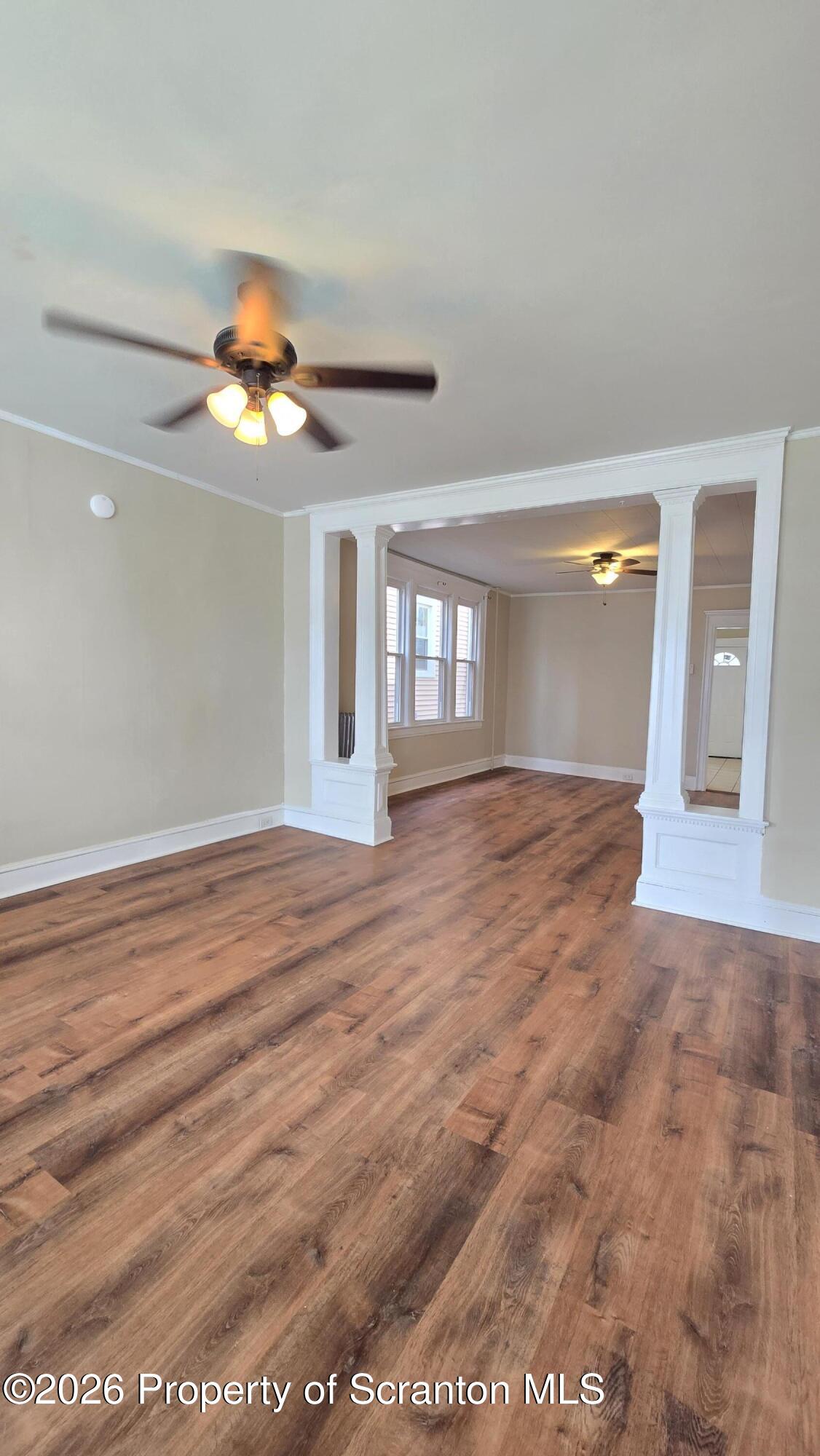 543 North Sumner Avenue Scranton, PA 18504 - Photo 3 of 16 wooden floor in an empty room with a window