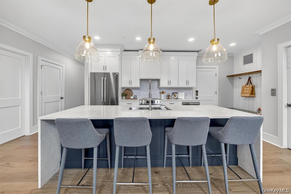 1828 Soundview Court Yorktown Heights, NY 10598 - Photo 10 of 39 a view of a a dining room and a kitchen island