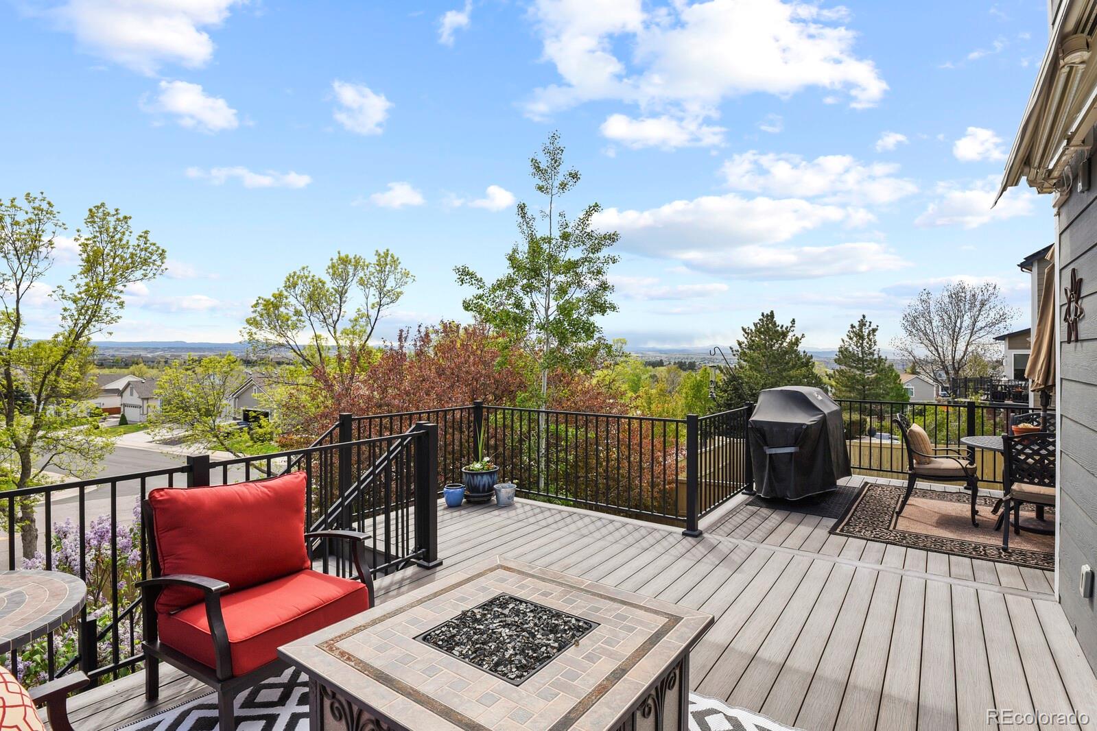 21018 Saddleback Circle Parker, CO 80138 - Photo 40 of 50 a view of a chairs on the roof deck
