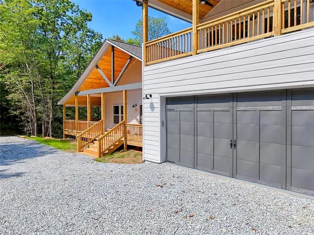 a kitchen with stove and cabinets