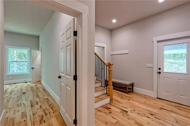 a view of a balcony with a tree