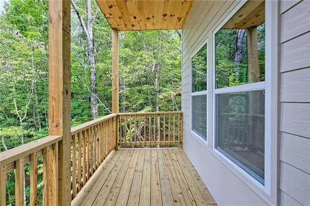 an aerial view of a house with outdoor space