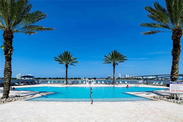 a patio with table and chairs
