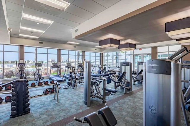 a swimming pool with outdoor seating and yard