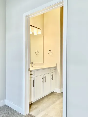 a sink with a mirror