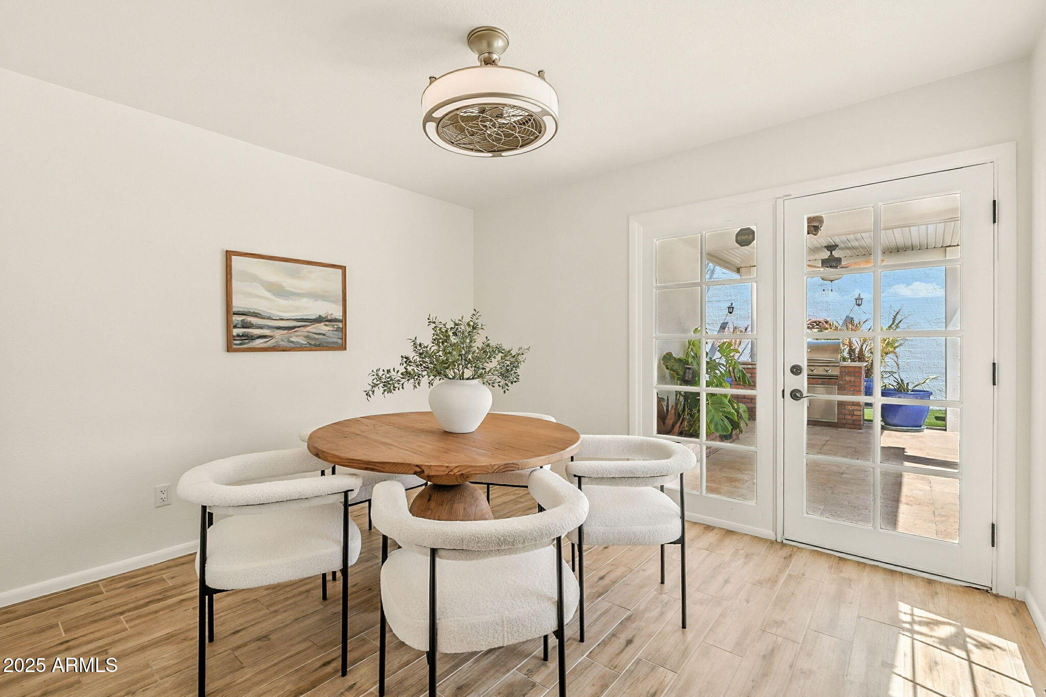43 East Boca Raton Road Phoenix, AZ 85022 - Photo 19 of 99 a dining room with furniture and wooden floor